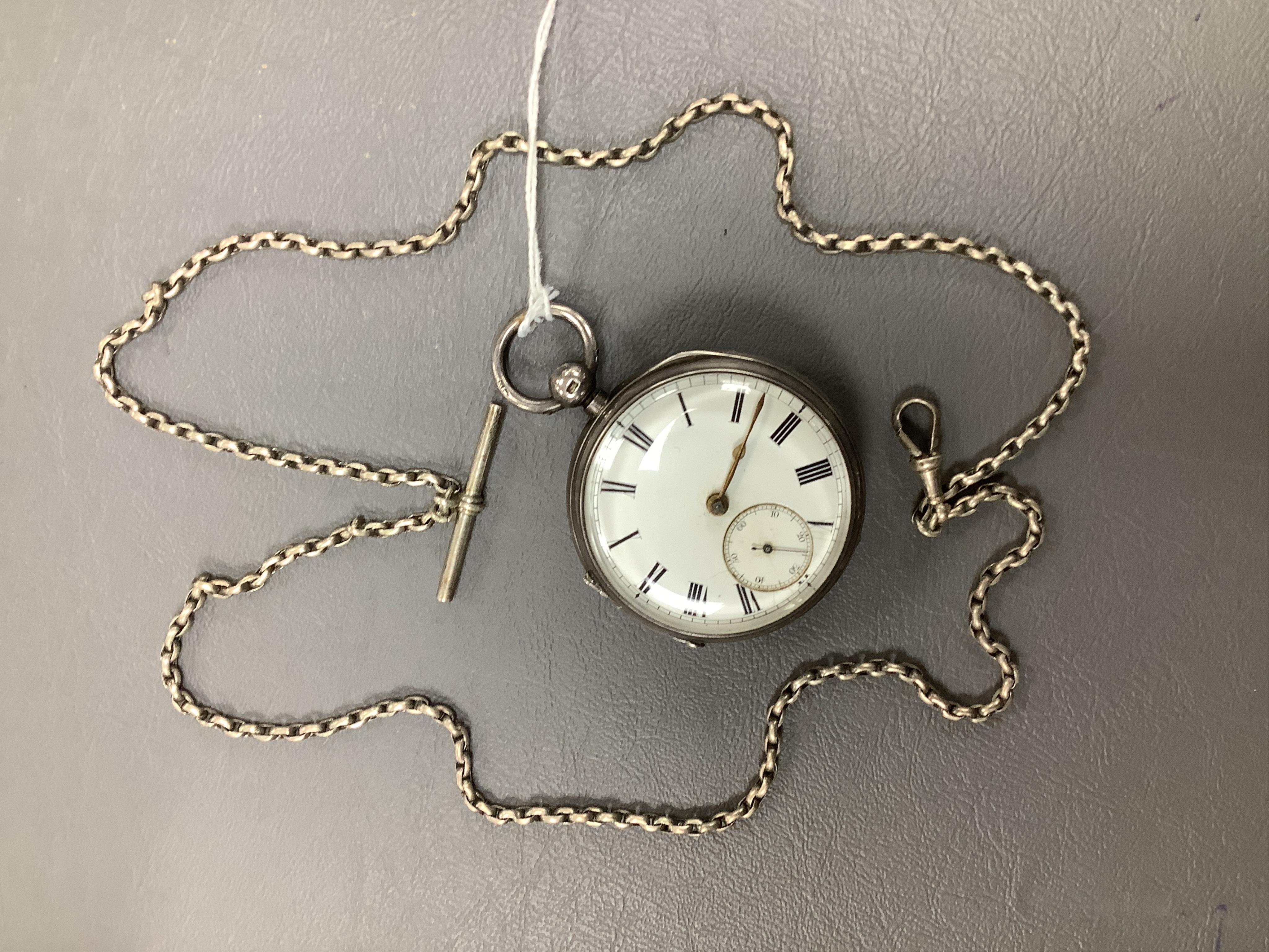 A late Victorian silver open faced keywind pocket watch, together with a Waltham gold plated pocket watch and six other items.